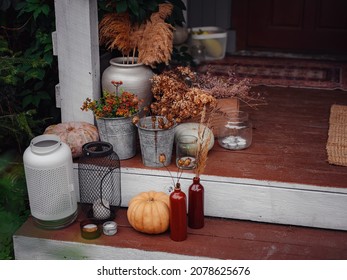 Autumn Wooden Porch Or Patio, Family Heirlooms, With Pumpkins And Cozy Blankets. Thanksgiving Landscaping Decor.