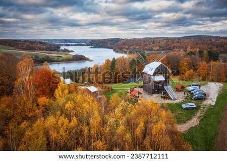 Autumnal landscape of Kashubian windmill, lakes and forests, Poland