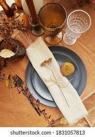 An Autumnal Wedding Tablescape Layered In Warm Hues And Textural Botanicals