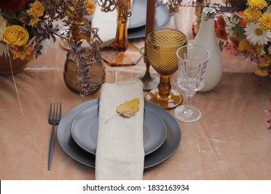 An Autumnal Wedding Tablescape Layered In Warm Hues And Textural Botanicals