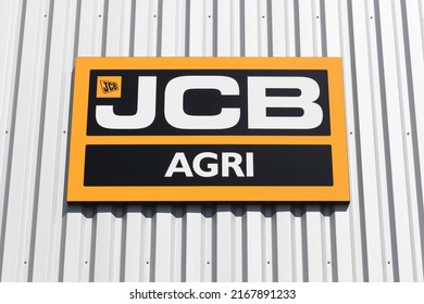 Autun, France - July 5, 2020: JCB logo on a wall. JCB is a British manufacturer of equipment for construction, agriculture, waste handling and demolition, founded in 1945 