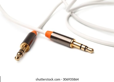 Auxiliary audio stereo cable cord male to male 3,5mm universal gold on white background