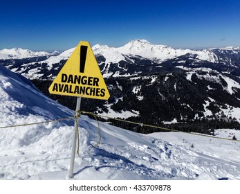 Avalanche Danger Sign In A Mountain Landscape