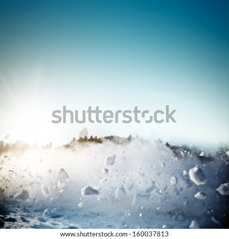 Avalanche in mountains. Real close-up photograph, fast snow motion towards camera
