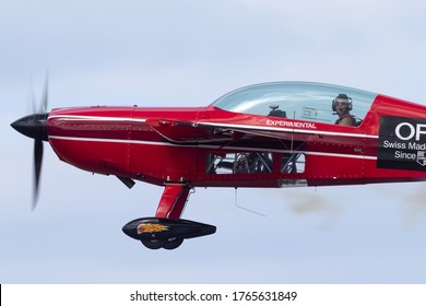 Avalon, Australia - February 28, 2015: Aerobatic pilot Melissa Pemberton (Melissa Andrzejewski) flying an Extra 300 aerobatic aircraft VH-CIZ.