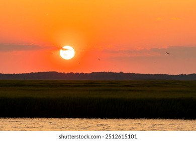 Avalon, New Jersey - Golden Hour Sunset over the Cape May National Wildlife Refuge - Powered by Shutterstock