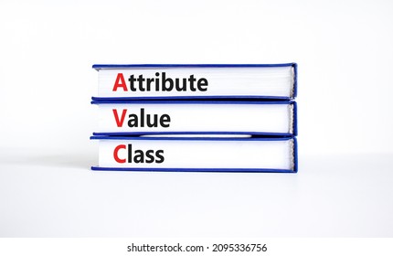 AVC attribute value class symbol. Concept words AVC attribute value class on books. Beautiful white table, white background, copy space. Business and AVC attribute value class concept.