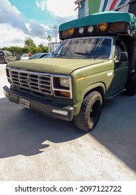 AVELLANEDA, ARGENTINA - Dec 06, 2021: Shot Of An Old Green Ford F Series Pickup Truck Seventh Generation 1980s  Nose And Cab  Expo Wheels 2021 