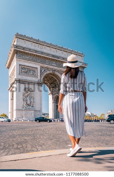 Avenue des Champs-Élysées Paris, woman looking at\
the champ elysee
