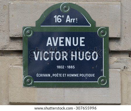 An Avenue Victor Hugo street sign in the 16th district of Paris France.
