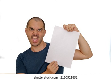 Average Looking White Short Haired Man Posing With A Blank Sheet Of Paper , Isolated Background