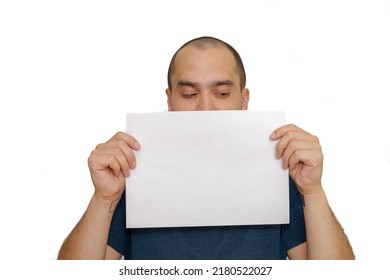 Average Looking White Short Haired Man Posing With A Blank Sheet Of Paper , Isolated Background