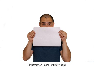 Average Looking White Short Haired Man Posing With A Blank Sheet Of Paper , Isolated Background