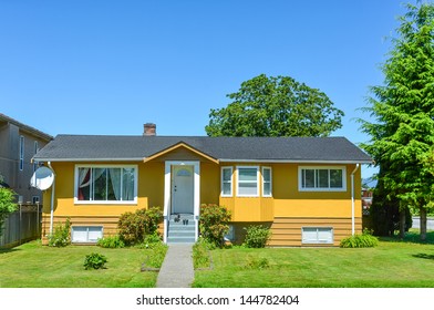 Average North American Family House On A Sunny Day