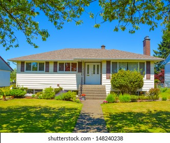 Average North American Family House On A Sunny Day