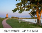 Avery Point Lighthouse in Groton, Connecticut, at sunset