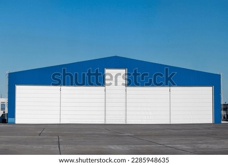 Aviation hangar outside on a clear day