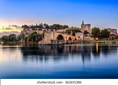 Avignon Bridge with Popes Palace and Rhone river at sunrise, Pont Saint-Benezet, Provence, France 