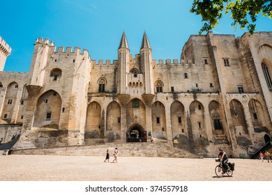 Avignon, France - June 27, 2015: People Walking Near Ancient Popes Palace, Saint-Benezet, Avignon, Provence, France. Famous Landmark