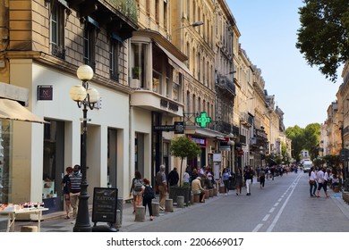 AVIGNON, FRANCE - SEPTEMBER 30, 2021: People Walk In Downtown Avignon, France. Historic Centre Of Avignon Is A UNESCO World Heritage Site.