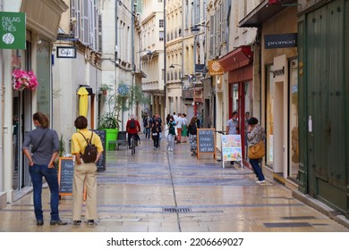 AVIGNON, FRANCE - SEPTEMBER 30, 2021: People Walk In Downtown Avignon, France. Historic Centre Of Avignon Is A UNESCO World Heritage Site.