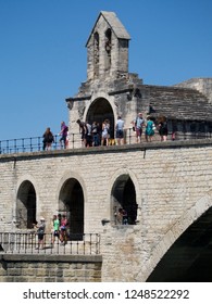 Avignon/France - August 10 2016: Saint Nicholas Chapel At The Pont Saint-Bénézet. The Pont Saint-Bénézet, Also Known As The Pont D'Avignon, Is A Famous Medieval Bridge In The Town Of Avignon.