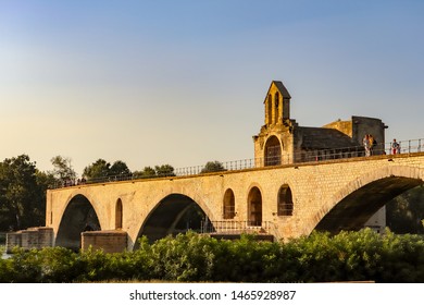 Avignon/France- July 27, 2019: The Old Bridge Of Avignon (pont Saint-Bénézet) In The Evening Sun