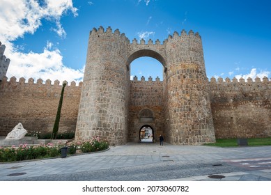 AVILA, SPAIN – JUNE 20, 2021: Gate of The Alcazar, one of the entrances in the Walls of Avila, Spain. This site is a National Monument, and the old city was declared a World Heritage site by UNESCO