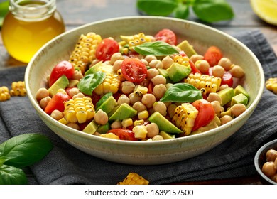 Avocado Chickpea Salad With Grilled Sweet Corn, Tomato And Basil. Healthy Vegan Food