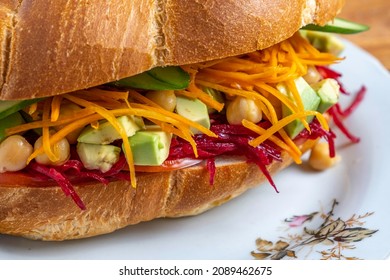 Avocado Chickpea Salad Sandwich On Vintage Plate.