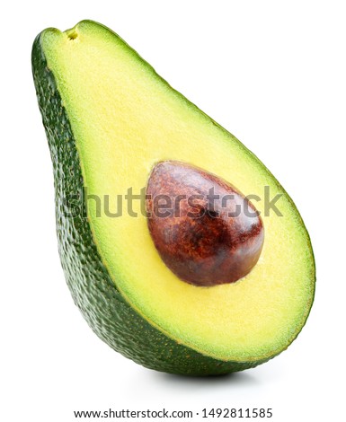 Avocado half isolated on white background. Ripe fresh green avocado Clipping Path
