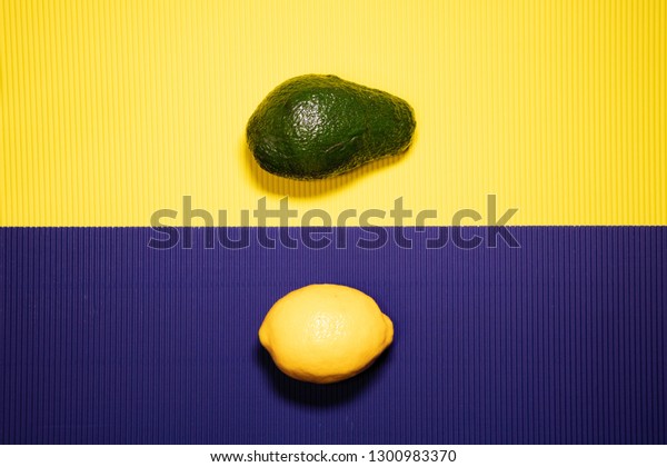 Download Avocado Lemon On Yellow Purple Background Stock Photo Edit Now 1300983370 Yellowimages Mockups