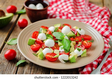 Avocado Mozzarella Tomato Basil Salad. Toning. Selective Focus