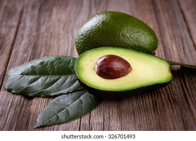 avocado on a dark wood background. 