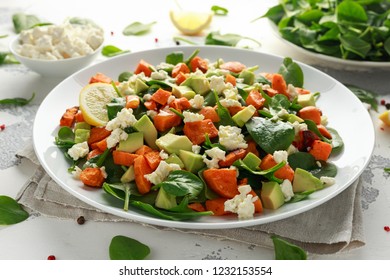 Avocado, Roasted Sweet Potato, Spinach, Feta Cheese Healthy Salad In White Plate