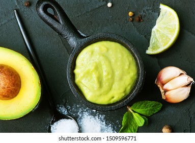 Avocado Sauce In Bowl And On A Table