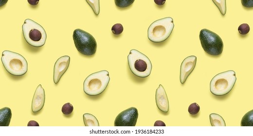 Avocado Seamless Pattern. Background Made From Isolated Avocado Pieces On Yellow Background. Flat Lay Of Whole And Half Avocados, Avacado Pieces And Seeds. 