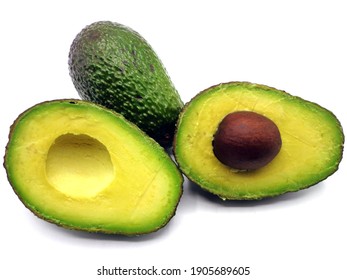 Avocado split in half, isolated on a white background