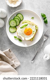 Avocado Toast With Fried Egg For Breakfast, Healthy Food, Overhead View