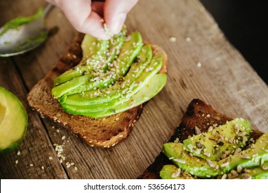 Avocado Toast In A Hand