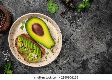 Avocado Toast. Healthy Toast With Avocado For Breakfast Or Lunch With Rye Bread. Clean Eating, Dieting, Vegan Food Concept. Food Recipe. Top View.