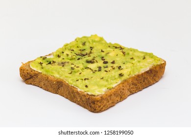 Avocado toast over a white background close up