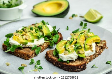 Avocado Toasts With Cheese, Pumpkin, Nut And Sesame. Healthy Fats, Clean Eating For Weight Loss.