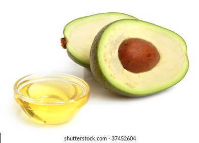 Avocado And Vegetable Oil On White Background