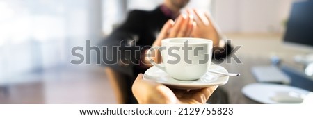 Avoid Coffee. Male With Heartburn Refusing Drink