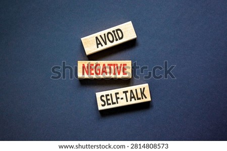 Avoid negative self-talk symbol. Concept words Avoid negative self-talk on beautiful wooden blocks. Beautiful black background. Business psychology avoid negative self-talk concept. Copy space.