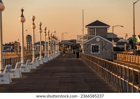 Avon By the Sea, New Jersey, USA - Golden hour sunrise on the jersey shore boardwalk in Avon by the Sea New Jersey 
