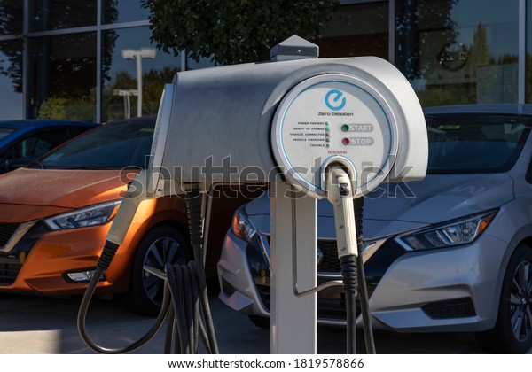 Avon - Circa September 2020: Electric Vehicle\
Quick Charger at a local Nissan Car Dealership. The Nissan LEAF EV\
is all electric.