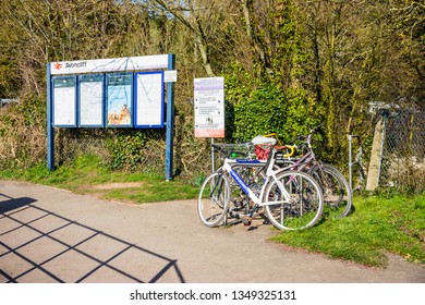 Avon Cliff , Wiltshire, February 27th 2019 Several Bicycles Secured To A Railing Near A Railway Noticeboard