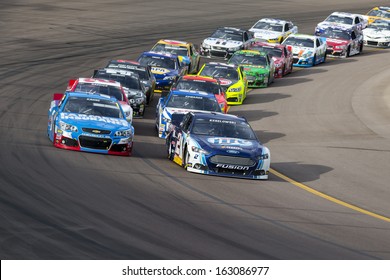 Avondale, AZ - Nov 10, 2013:  The NASCAR Sprint Cup Teams Take To The Track For The AdvoCare 500 Race At The Phoenix International Raceway In Avondale, AZ On Nov 10, 2013.